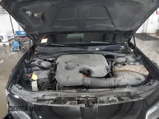 2019 Chrysler 300 with VIN 2C3CCABG6KH617913, listed as a IAAI auction lot 41558437 with 113,073 mi miles. Bid and sale history available at carsss.com. Image 10.
