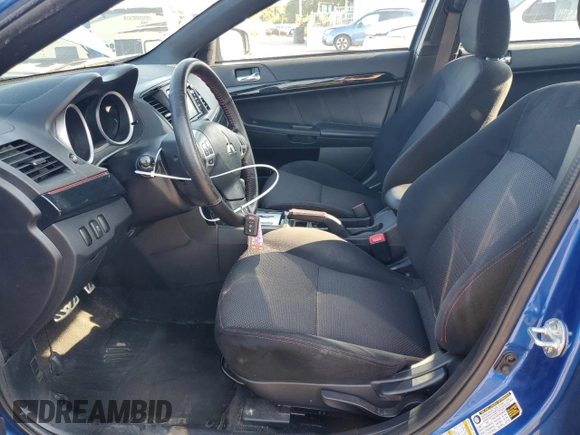 2017 Mitsubishi Lancer ES with VIN JA32U2FU4HU010651, listed as a Copart auction lot 70334394 with 56,252 mi miles and Salvage Title. Bid and sale history available at DreamBid. Image 7.