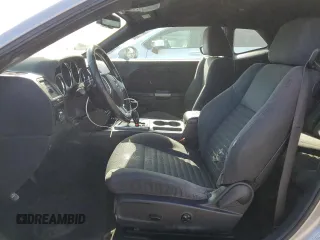 2014 Dodge Challenger R/T z VIN 2C3CDYBT2EH101684, wystawiony jako Copart lot #53581785 z przebiegiem 159 637 mil mil oraz Szkoda całkowita • Salvage title. Historia ofert i sprzedaży dostępna na DreamBid. Obrazek 7.