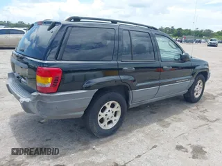 2002 Jeep Grand Cherokee Laredo with VIN 1J4GX48S22C226527, listed as a IAAI auction lot 42630457 with 197,333 mi miles and . Bid and sale history available at DreamBid. Image 4.