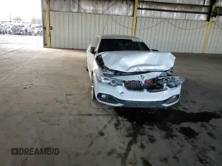 2015 BMW 4 Series 428i z VIN WBA3V5C51FP751530, wystawiony jako Copart lot #88903455 z przebiegiem 71 529 mil mil oraz Szkoda całkowita • Salvage title. Historia ofert i sprzedaży dostępna na DreamBid. Obrazek 11.