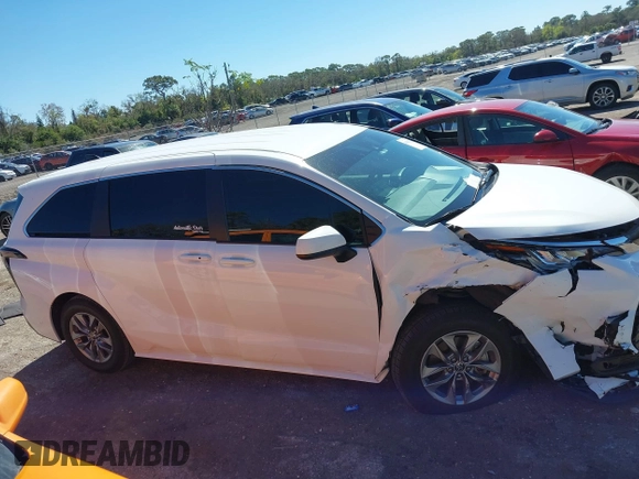 2023 Toyota Sienna LE with VIN 5TDKRKEC2PS173314, listed as a IAAI auction lot 41601728 with 50,873 mi miles. Bid and sale history available at carsss.com. Image 13.