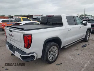 2022 GMC Sierra 1500 Denali with VIN 3GTU9FELXNG127029, listed as a IAAI auction lot 42062882 with 24,082 mi miles and . Bid and sale history available at DreamBid. Image 4.