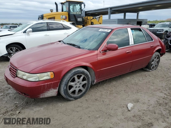 2002 Cadillac Seville Touring STS z VIN 1G6KY54902U132357, wystawiony jako Copart lot #42008795 z przebiegiem 111 014 mil mil oraz Szkoda całkowita • Salvage title. Historia ofert i sprzedaży dostępna na DreamBid. Obrazek 1.