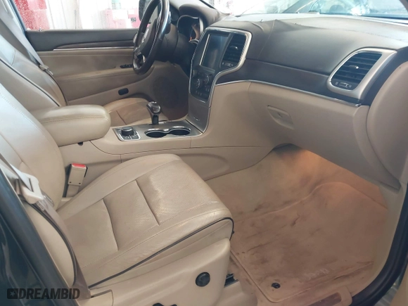 2014 Jeep Grand Cherokee Overland with VIN 1C4RJFCT7EC187319, listed as a IAAI auction lot 41256107 with 98,287 mi miles. Bid and sale history available at carsss.com. Image 5.