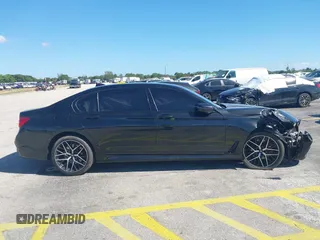 2016 BMW 7 Series 740i с VIN WBA7E2C51GG738889, выставлен на аукционе IAAI как лот 41838071 с пробегом 49 649 миль миль и . История ставок и продаж доступна на DreamBid. Изображение 13.