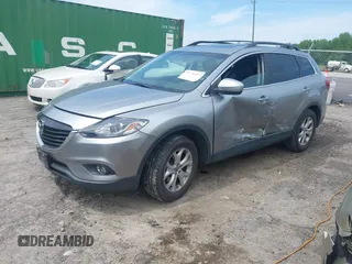 2013 Mazda CX-9 Touring with VIN JM3TB2CV5D0402135, listed as a IAAI auction lot 42108357 with 190,863 mi miles and . Bid and sale history available at DreamBid. Image 2.