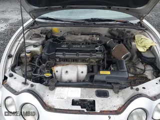 2001 Hyundai Tiburon with VIN KMHJG25F81U267658, listed as a IAAI auction lot 41092438 with 188,575 mi miles. Bid and sale history available at carsss.com. Image 10.