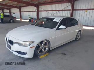 2013 BMW 3 Series 328i with VIN WBA3C1C50DF438180, listed as a IAAI auction lot 42082401 with 206,412 mi miles. Bid and sale history available at carsss.com. Image 2.