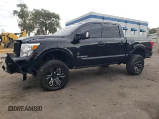 2022 Nissan Titan SV with VIN 1N6AA1ED2NN103267, listed as a Copart auction lot 68942064 with 55,119 mi miles and Salvage title. Bid and sale history available at DreamBid. Image 1.