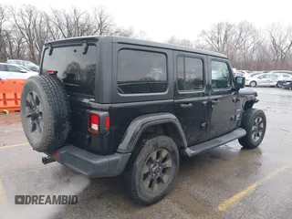 2018 Jeep Wrangler Unlimited Sahara z VIN 1C4HJXEN6JW332956, wystawiony jako IAAI lot #41477681 z przebiegiem 97 446 mil mil oraz . Historia ofert i sprzedaży dostępna na DreamBid. Obrazek 4.