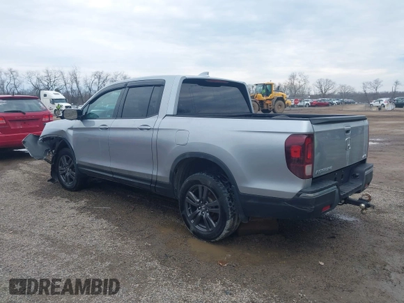 2020 Honda Ridgeline Sport with VIN 5FPYK3F13LB023123, listed as a IAAI auction lot 41694273 with 51,934 mi miles and . Bid and sale history available at DreamBid. Image 3.