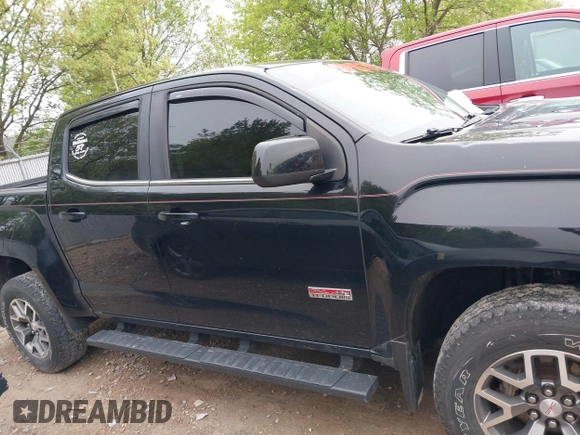 2017 GMC Canyon 4WD SLE z VIN 1GTG6CEN9H1140962, wystawiony jako IAAI lot #42251320 z przebiegiem 142 099 mil mil oraz . Historia ofert i sprzedaży dostępna na DreamBid. Obrazek 13.