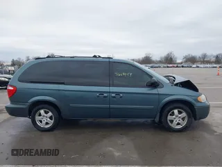 2005 Dodge Caravan SXT with VIN 2D4GP44LX5R115310, listed as a IAAI auction lot 41668454 with 115,784 mi miles and . Bid and sale history available at DreamBid. Image 14.