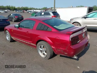 2005 Ford Mustang Deluxe with VIN 1ZVFT80N655177798, listed as a IAAI auction lot 42411831 with 112,236 mi miles and . Bid and sale history available at DreamBid. Image 3.