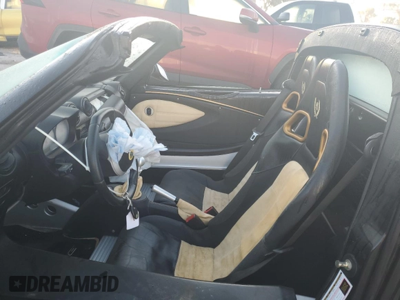 2007 Lotus Elise z VIN SCCPC11107HL33067, wystawiony jako Copart lot #83812274 z przebiegiem Nie podano mil oraz Szkody całkowita. Historia ofert i sprzedaży dostępna na DreamBid. Obrazek 7.