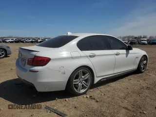 2013 BMW 5 Series 550i xDrive with VIN WBAFU9C52DDY71651, listed as a Copart auction lot 52156465 with 144,211 mi miles and Salvage title. Bid and sale history available at DreamBid. Image 3.