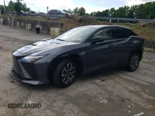 2023 Lexus RZ 450e Premium z VIN JTJAAAAB8PA020411, wystawiony jako Copart lot #58023424 z przebiegiem 1274 mil mil oraz Szkody całkowita. Historia ofert i sprzedaży dostępna na DreamBid. Obrazek 1.