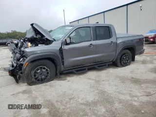 2024 Nissan Frontier Pro-X z VIN 1N6ED1EJ2RN605409, wystawiony jako Copart lot #85559674 z przebiegiem 6 850 mil mil oraz Nie do naprawy • Non repairable. Historia ofert i sprzedaży dostępna na DreamBid. Obrazek 1.