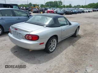 2002 Mazda MX-5 Miata Cloth with VIN JM1NB353420219700, listed as a IAAI auction lot 42510532 with 168,498 mi miles and . Bid and sale history available at DreamBid. Image 4.