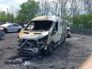 2015 Ford Transit Cargo with VIN 1FTNR2CG5FKA99184, listed as a IAAI auction lot 42143175 with Not provided miles and . Bid and sale history available at DreamBid. Image 2.