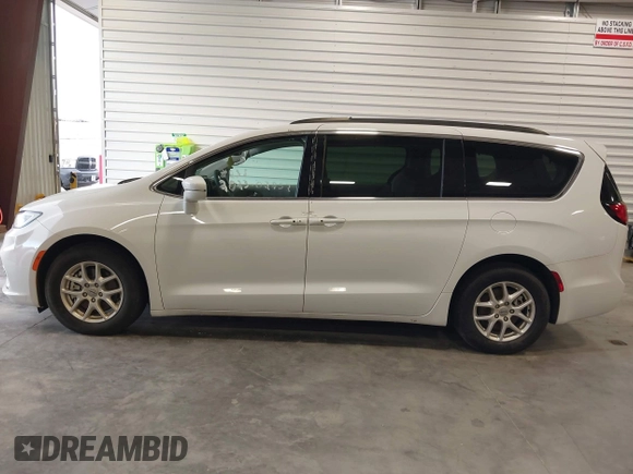 2022 Chrysler Pacifica Touring L with VIN 2C4RC1BGXNR144831, listed as a IAAI auction lot 40473026 with 36,495 mi miles and . Bid and sale history available at DreamBid. Image 14.