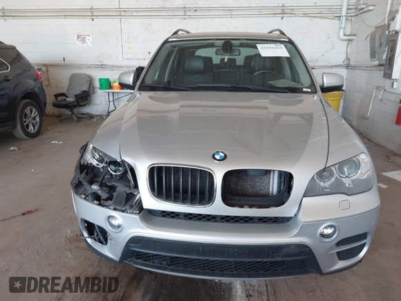 2013 BMW X5 xDrive35i z VIN 5UXZV4C55D0B09049, wystawiony jako IAAI lot #42193454 z przebiegiem 186 845 mil mil oraz . Historia ofert i sprzedaży dostępna na DreamBid. Obrazek 12.