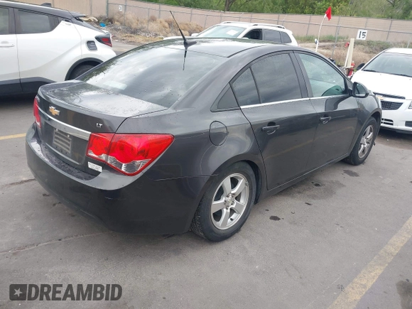 2014 Chevrolet Cruze 1LT with VIN 1G1PC5SB4E7134678, listed as a IAAI auction lot 42171165 with 125,225 mi miles and . Bid and sale history available at DreamBid. Image 4.