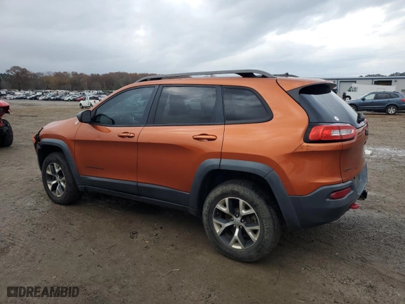 2015 Jeep Cherokee Trailhawk with VIN 1C4PJMBSXFW704942, listed as a Copart auction lot 85514044 with 194,340 mi miles and Salvage Title. Bid and sale history available at carsss.com. Image 2.