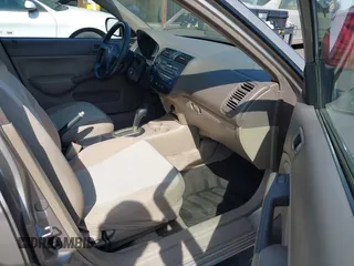 2001 Honda Civic LX with VIN 2HGES16541H509564, listed as a IAAI auction lot 42121423 with 129,561 mi miles. Bid and sale history available at carsss.com. Image 5.