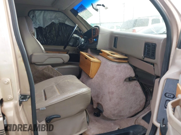 1996 Ford Econoline Cargo z VIN 1FDEE14H2THB68737, wystawiony jako IAAI lot #41919471 z przebiegiem Nie podano mil oraz . Historia ofert i sprzedaży dostępna na DreamBid. Obrazek 5.