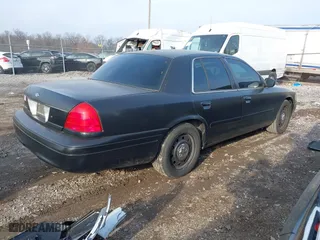 2006 Ford Police Interceptor with VIN 2FAHP71W76X142677, listed as a IAAI auction lot 41173196 with 152,236 mi miles. Bid and sale history available at carsss.com. Image 4.