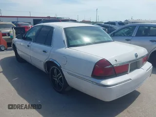 2000 Mercury Grand Marquis LS z VIN 2MEFM75W2YX731383, wystawiony jako IAAI lot #42262528 z przebiegiem 172 940 mil mil oraz . Historia ofert i sprzedaży dostępna na DreamBid. Obrazek 3.