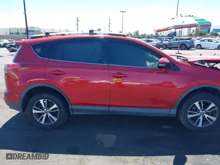 2016 Toyota RAV4 XLE with VIN 2T3WFREV3GW239632, listed as a IAAI auction lot 41860727 with 135,850 mi miles. Bid and sale history available at carsss.com. Image 13.