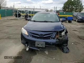 2012 Toyota Corolla L with VIN 2T1BU4EE2CC765245, listed as a Copart auction lot 52449945 with 152,557 mi miles and Salvage Title. Bid and sale history available at DreamBid. Image 11.