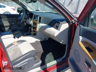 2009 Jeep Grand Cherokee Limited with VIN 1J8HR58P69C553747, listed as a IAAI auction lot 41860865 with 169,841 mi miles. Bid and sale history available at carsss.com. Image 5.