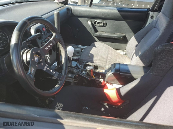 1991 Mazda MX-5 Miata Special Edition with VIN JM1NA3510M1221829, listed as a Copart auction lot 48374675 with 175,617 mi miles and Salvage Title. Bid and sale history available at carsss.com. Image 7.