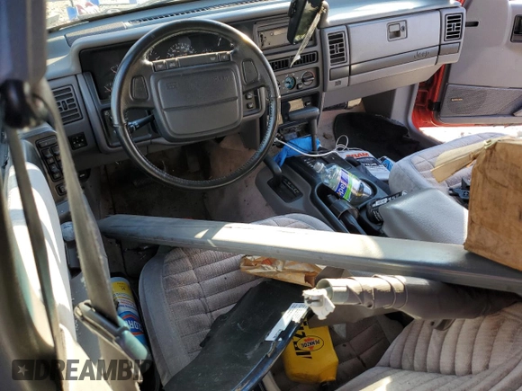1994 Jeep Grand Cherokee Laredo с VIN 1J4GZ58S1RC119463, выставлен на аукционе Copart как лот 48240315 с пробегом 126 826 миль миль и Списание • Salvage title. История ставок и продаж доступна на DreamBid. Изображение 8.