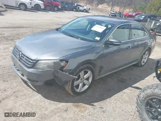 2013 Volkswagen Passat SE w/Sunroof with VIN 1VWBH7A39DC070066, listed as a IAAI auction lot 41956865 with 186,414 mi miles. Bid and sale history available at carsss.com. Image 2.