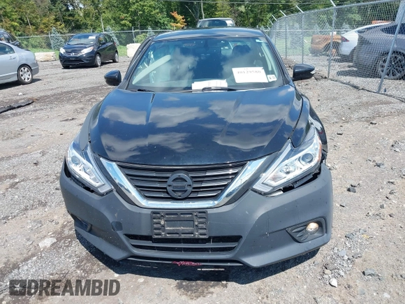 2017 Nissan Altima SV with VIN 1N4AL3AP0HC144575, listed as a IAAI auction lot 40129580 with 184,765 mi miles and . Bid and sale history available at DreamBid. Image 12.