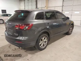 2014 Mazda CX-9 Sport with VIN JM3TB3BV3E0434817, listed as a IAAI auction lot 41394036 with 157,304 mi miles. Bid and sale history available at carsss.com. Image 4.
