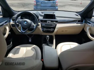 2017 BMW X1 xDrive28i with VIN WBXHT3Z3XH4A55624, listed as a Copart auction lot 59773545 with 140,251 mi miles and Salvage title. Bid and sale history available at DreamBid. Image 8.