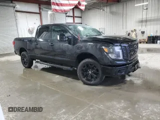 2019 Nissan Titan XD SL with VIN 1N6BA1F42KN511931, listed as a Copart auction lot 43820995 with 249,306 mi miles and Salvage Title. Bid and sale history available at carsss.com. Image 4.