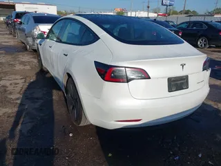 2023 Tesla Model 3 Long Range with VIN 5YJ3E1EB6PF633550, listed as a IAAI auction lot 41861278 with 45,743 mi miles and . Bid and sale history available at DreamBid. Image 3.