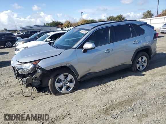 2019 Toyota RAV4 XLE with VIN 2T3W1RFV0KW036705, listed as a Copart auction lot 80983694 with 110,823 mi miles and Salvage Title. Bid and sale history available at carsss.com. Image 1.