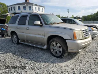 2006 Cadillac Escalade z VIN 1GYEK63N76R136618, wystawiony jako Copart lot #58990945 z przebiegiem Nie podano mil oraz Czysty tytuł • Clean title. Historia ofert i sprzedaży dostępna na DreamBid. Obrazek 4.