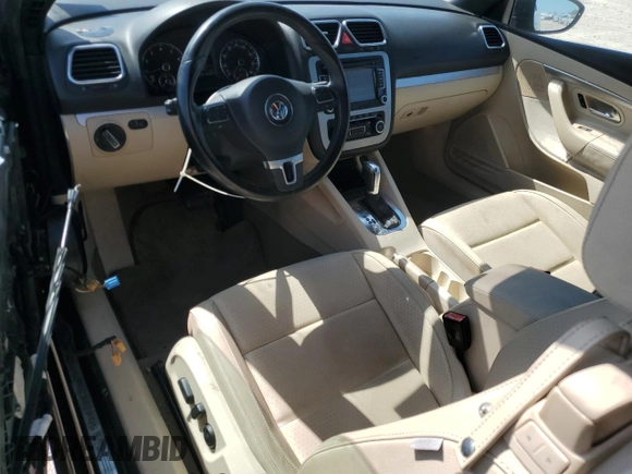 2012 Volkswagen Eos Komfort с VIN WVWBW7AH7CV007183, выставлен на аукционе Copart как лот 52561265 с пробегом 126 262 миль миль и Списание • Salvage title. История ставок и продаж доступна на DreamBid. Изображение 8.