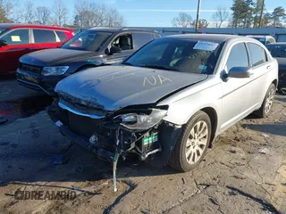 2013 Chrysler 200 LX with VIN 1C3CCBAG0DN739457, listed as a IAAI auction lot 41326667 with 82,537 mi miles. Bid and sale history available at carsss.com. Image 2.