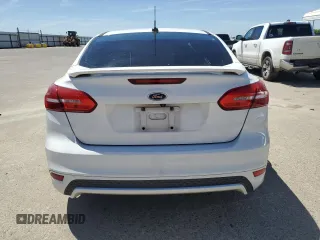 2016 Ford Focus SE with VIN 1FADP3F22GL329241, listed as a Copart auction lot 58095135 with 105,079 mi miles and Salvage title. Bid and sale history available at DreamBid. Image 6.
