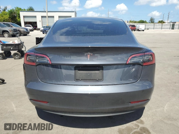 2023 Tesla Model 3 with VIN 5YJ3E1EA8PF704349, listed as a Copart auction lot 60220665 with 18,873 mi miles and Non repairable. Bid and sale history available at DreamBid. Image 6.